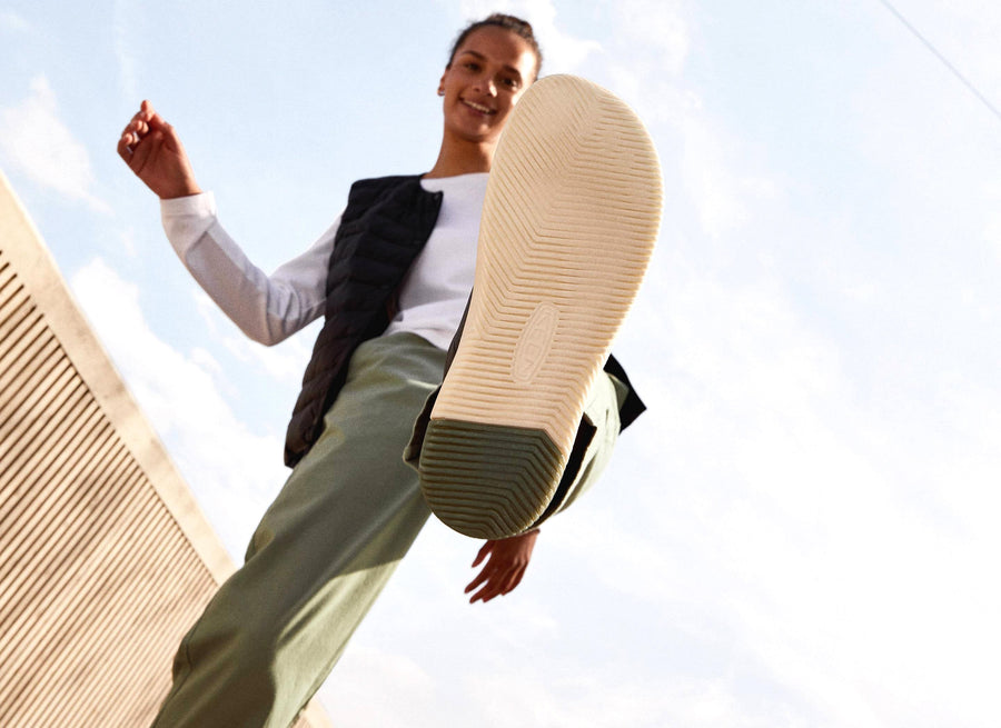 view from under a person's low drop shoe