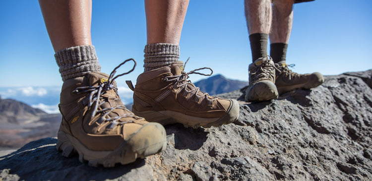 People wearing KEEN's iconic Targhee hiking boots on a ridge