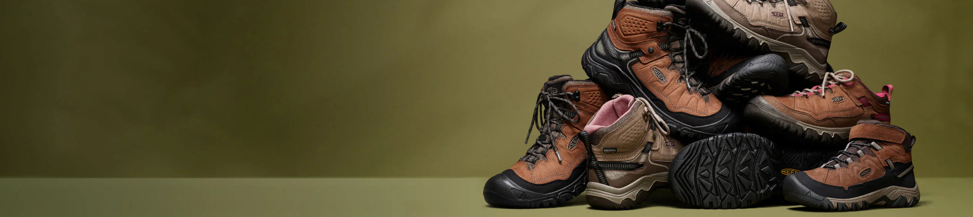 Illustration of mountains and Targhee hiking boot with blue text that reads "The World's cleanest shoes"