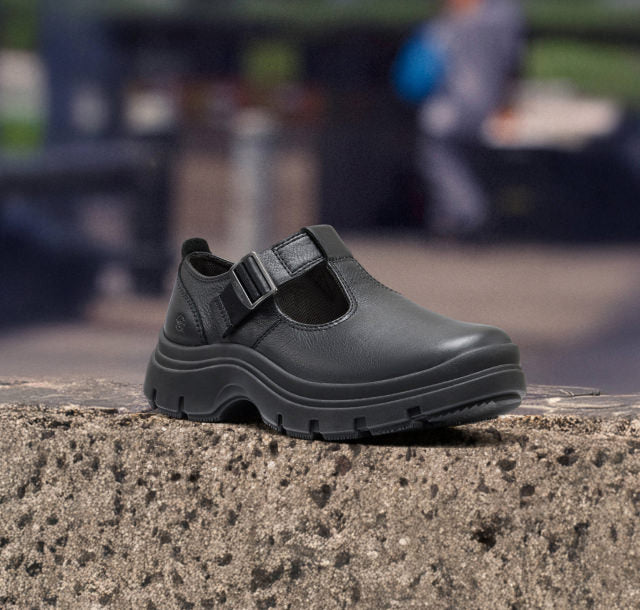 Elegant black leather Kosa mary jane with a side buckle for added style and support.