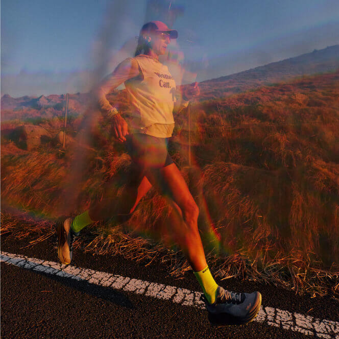 Time lapsed image of runner on desert road