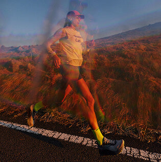 Time lapsed image of runner on desert road