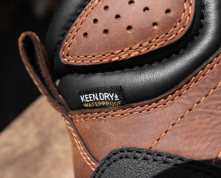 Closeup view of KEEN DRY waterproof tag on Camden work boot