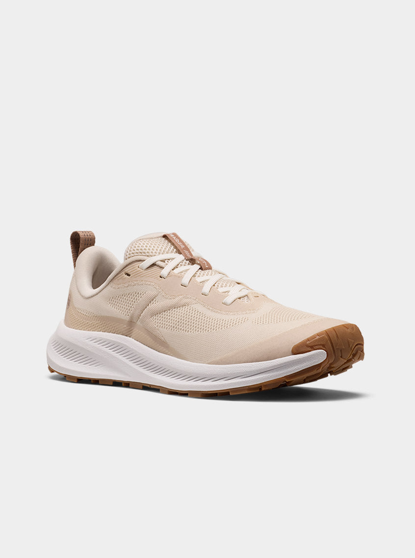 Product shot of women's birch and star white Wander trail-running shoe.