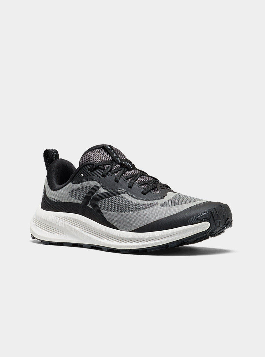 Product shot of women's black, gray and white Wander trail-running shoe.